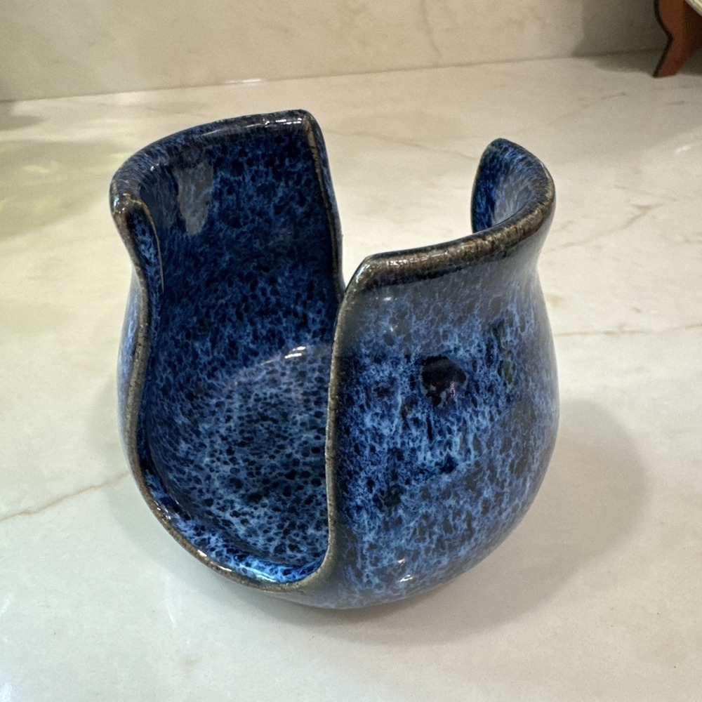 Wizard of Clay Dark Blue on black sponge holder